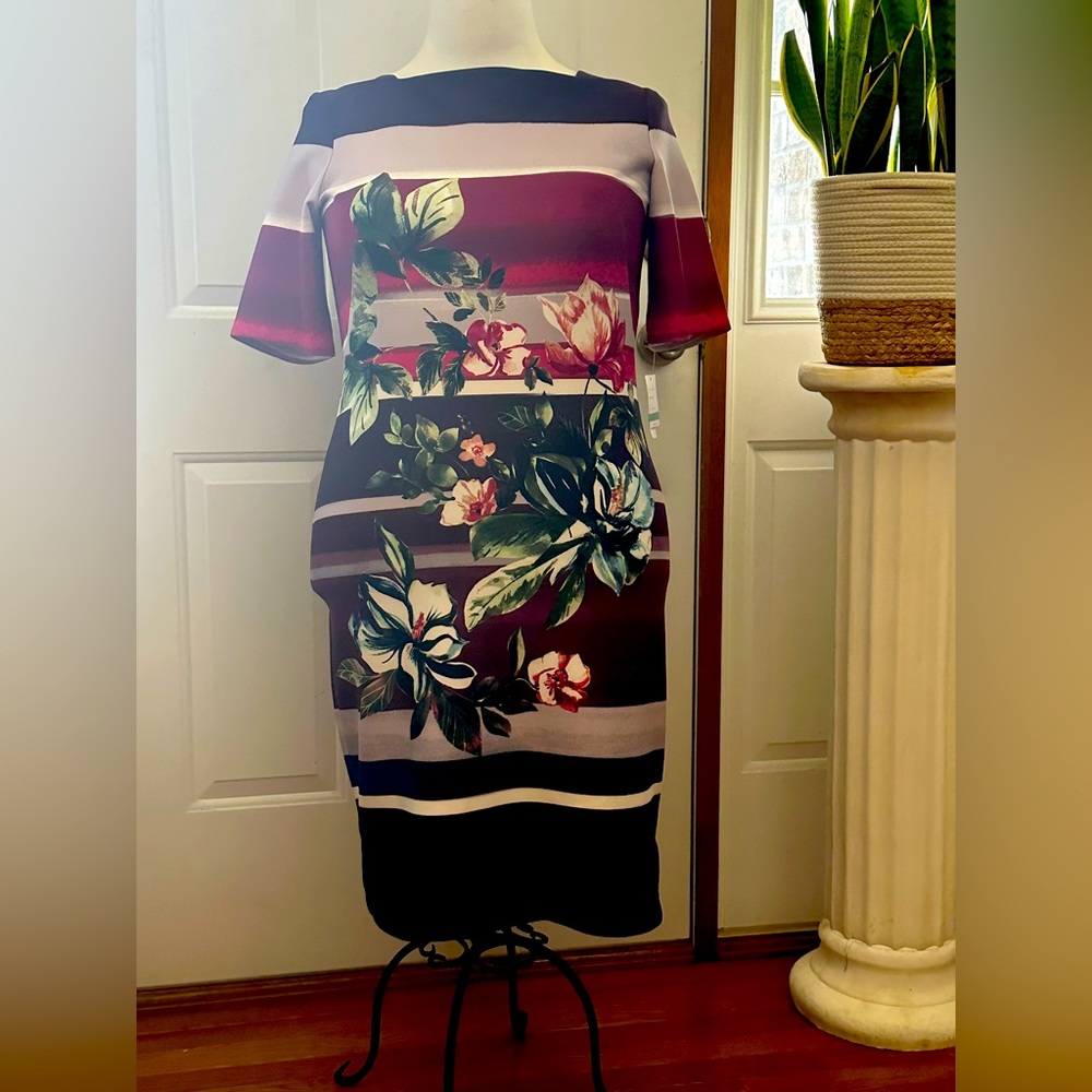 Gabby Skye dress with bold back zipper.